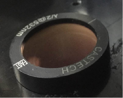 Procedure for maintaining the focusing lens of a laser cutting